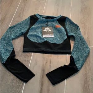 Engineered life tea and black active crop top. New